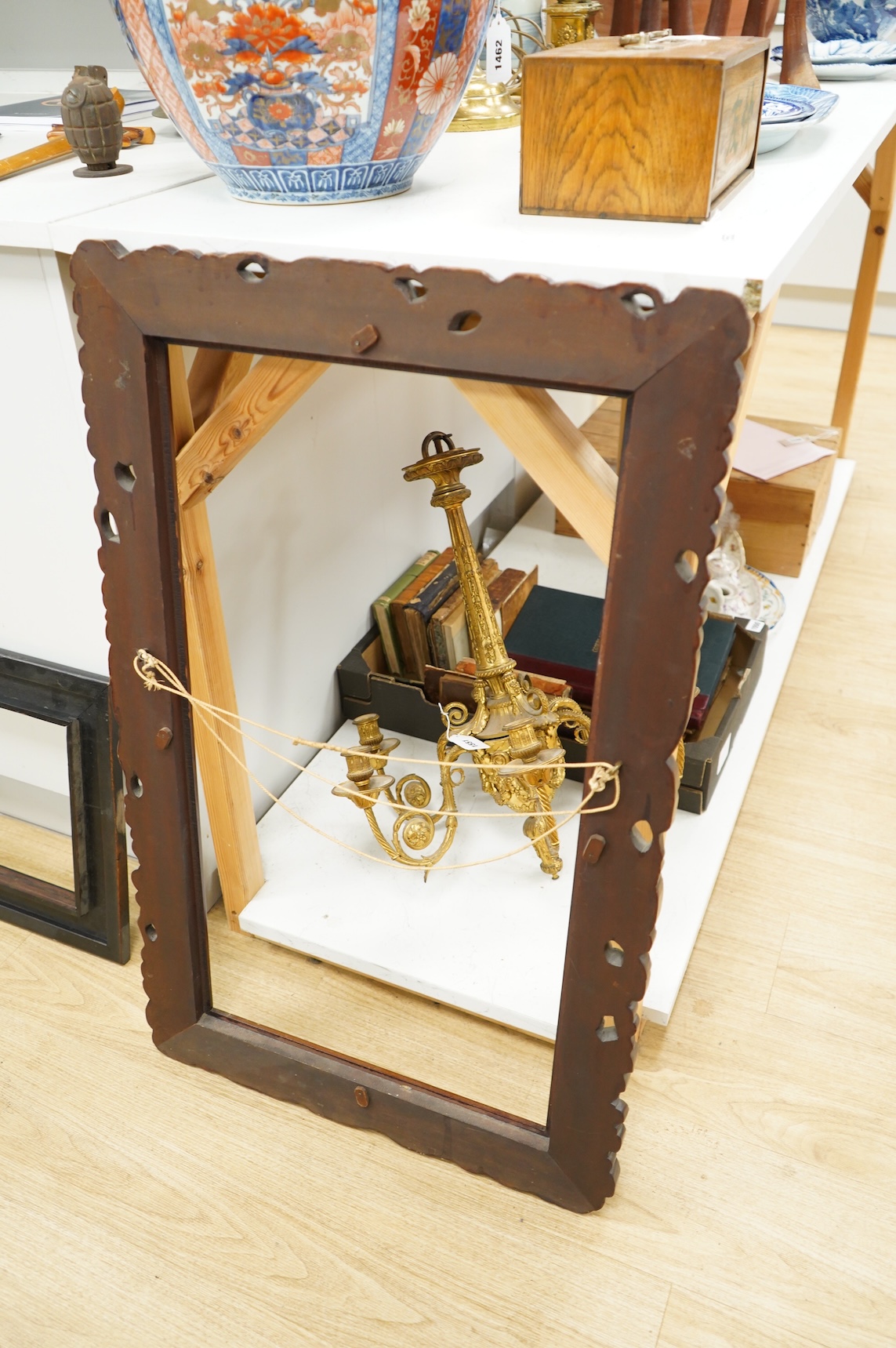 Two picture frames to include a carved wood example, aperture size 74 x 41cm